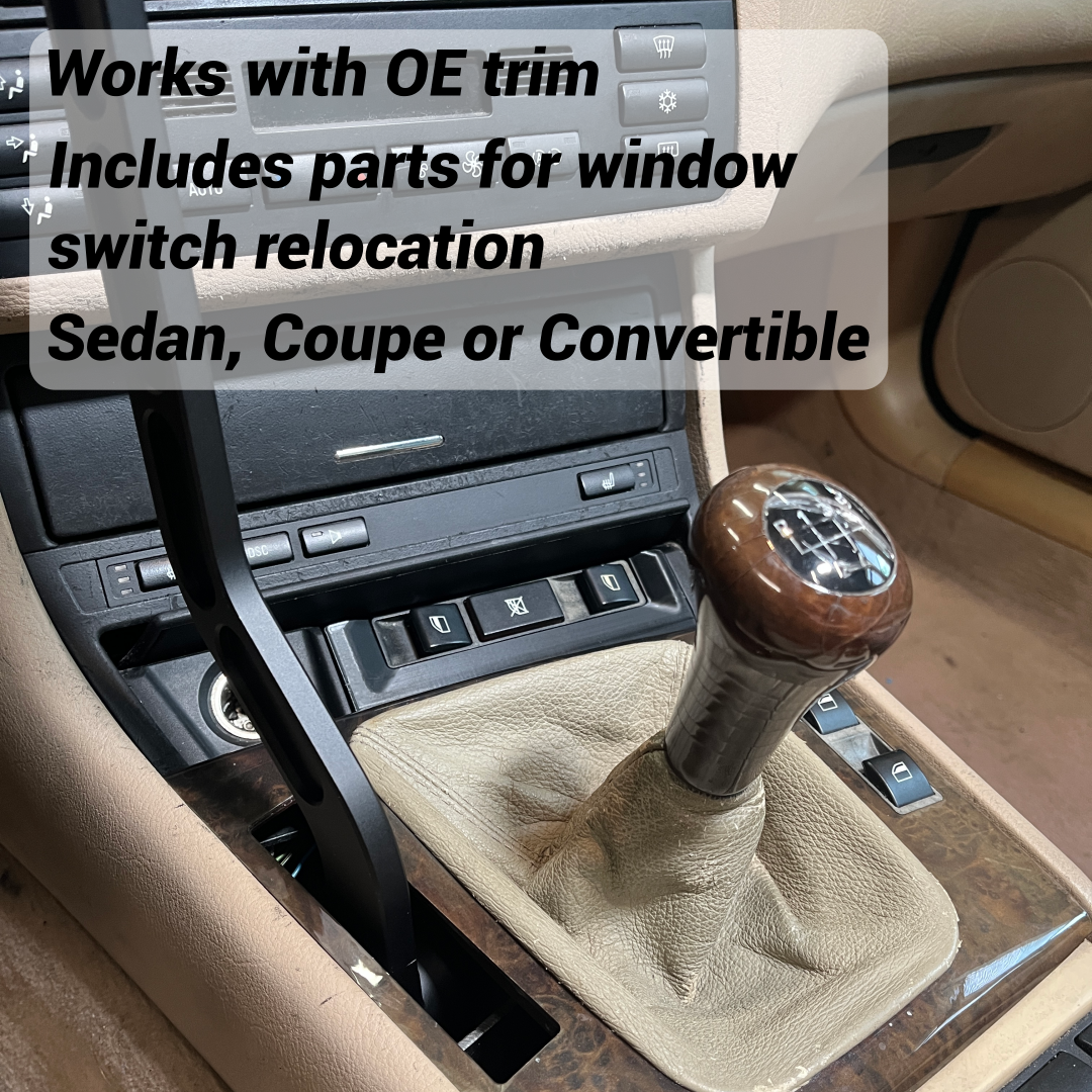 Driver's side window switch relocation in car